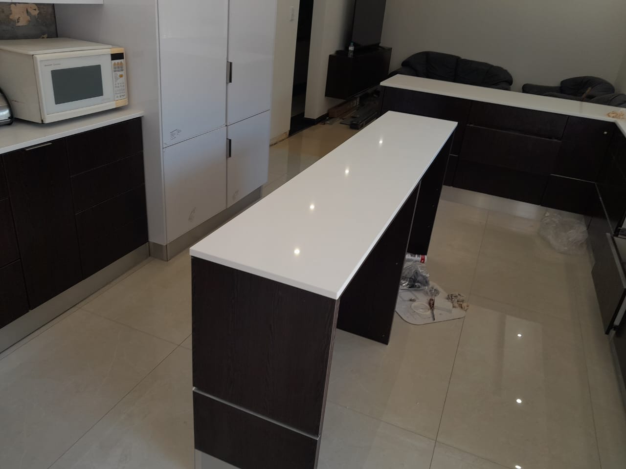 White Apex kitchen island countertop installation