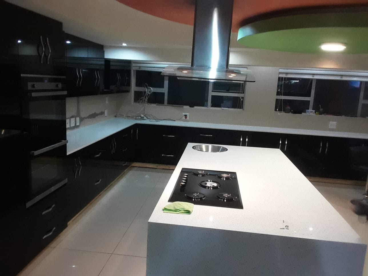 Apex kitchen countertop installation with island cooktop