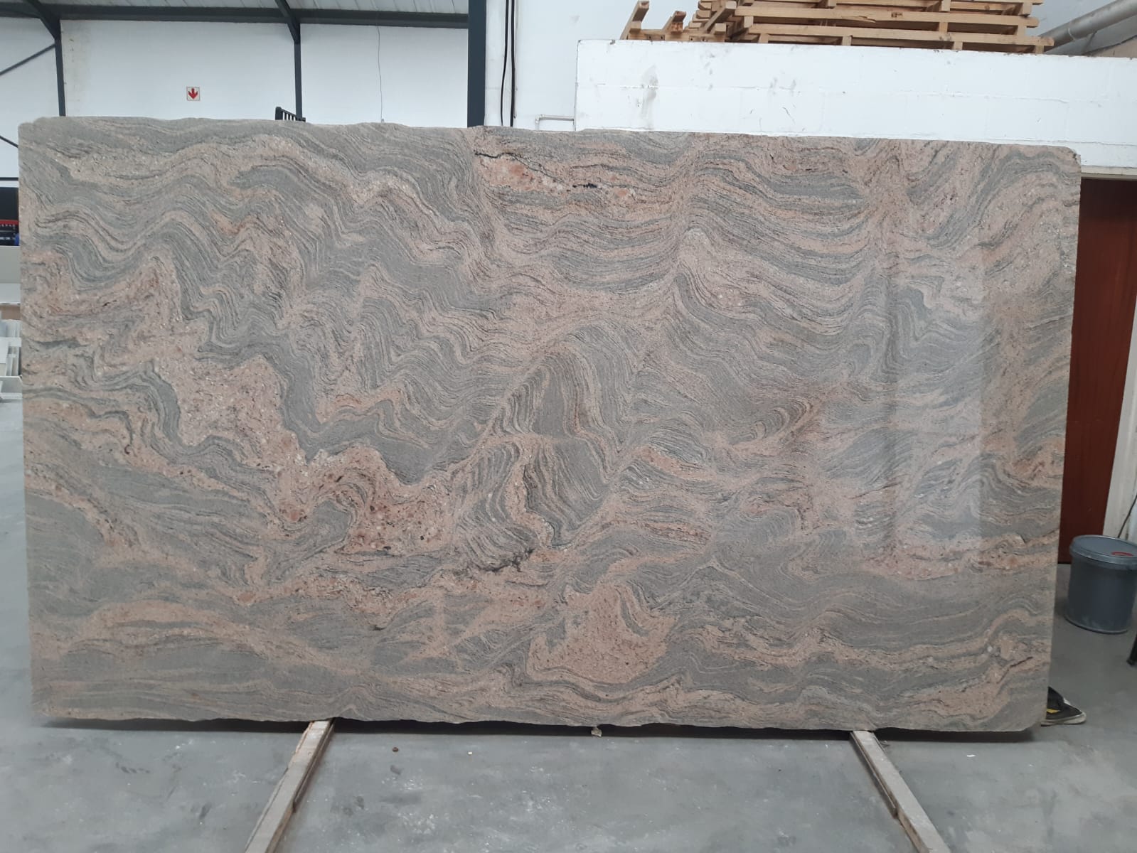 Polished granite slab edge with natural veining